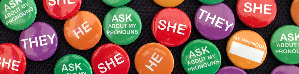 Five different buttons stating ask about my pronouns, they, my pronouns are, she, and he